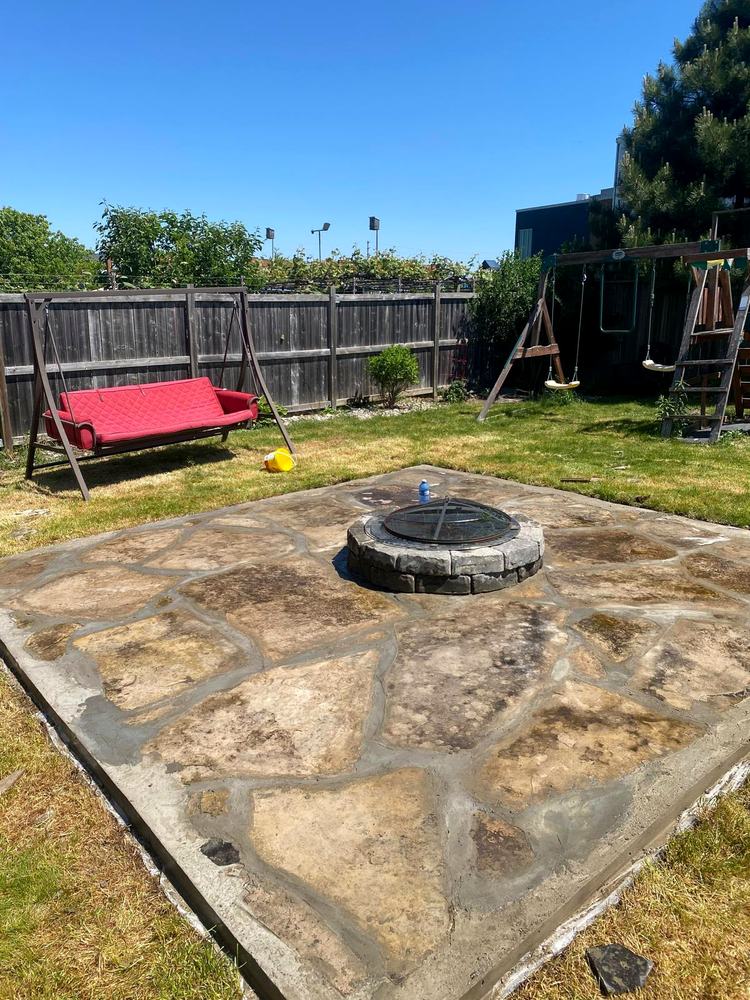 New flagstone patio laid and finished around the fire pit