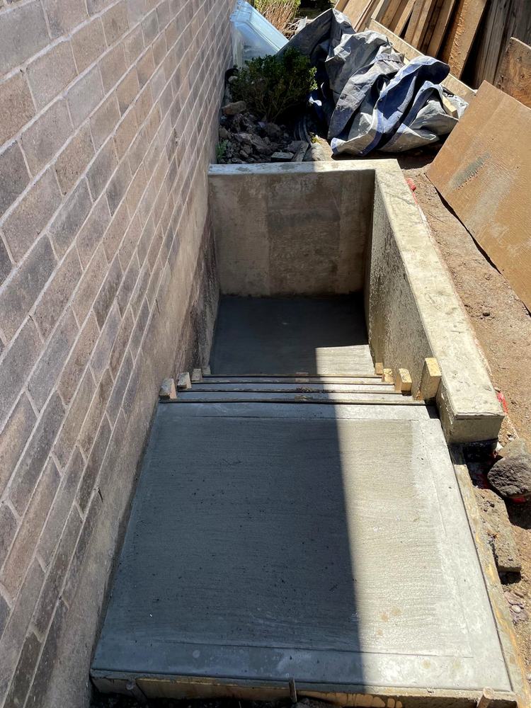 Fresh concrete poured and finished in the walkout