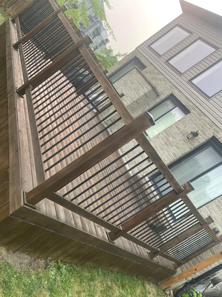 Deck rebuilt, stained and sealed with new railing